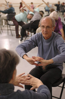 Two photos of Mark Morris Dance Centerâ€™s â€œDance for PDâ€ (Parkinsonâ€™s disease) class.	Photo by  Katsuyoshi Tanaka