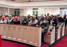 Members of the Iqra Mosque are treated to a presentation on Plymouth Church, which hosted a second interfaith dinner earlier this year.	Photo by Mehmet Akif Yilmaz