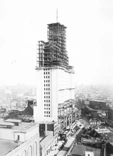 The photo below shows the site of the Williamsburgh Savings Bank tower in July 1927, before the tower was built. Ground had already been broken for construction and a fence surrounded the site. Several buildings had been demolished to make way for the tower. Photos by H.W. Hinson/  courtesy of the Brooklyn Historical Society