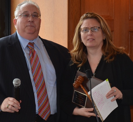 President Rosenthal (left) presents the Lifetime Service Award to the late Hon. Bruce Gouldâ€™s daughter, Melinda Gould Konopko. 