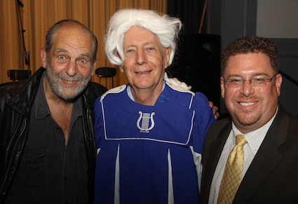 Robert Grossman (who designed reunion's program cover), Steve Ellman, and Principal David Cohen.
