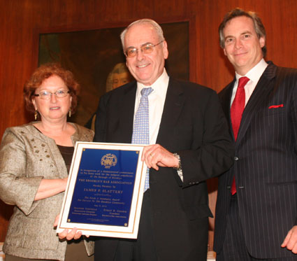 Current Brooklyn Bar Association (BBA) President Ethan Gerber (right) and Brooklyn Volunteer Lawyers Project Executive Director Jeannie Costello (left) presented attorney James Slattery (center) with the Freda S. Nisnewitz Award for Pro Bono Service.