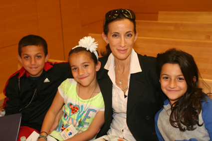 Law secretary Gigi Giannakouros and her kids Athena and Acasia Giannakouros, and William Wallace.