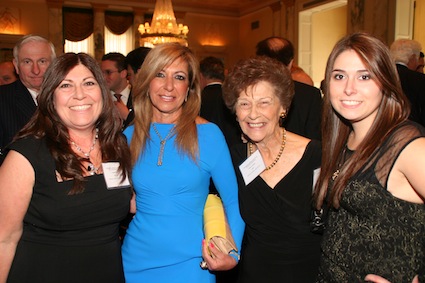  Hon. Patricia Di Mango (second from left) and her sister Joanne Orr (left), her mother Mafalda Di Mango (second from right) and niece Lauren Orr (right). The Columbian Lawyers Association presented Di Mangoâ€™s father Anthony Di Mango (not pictured) with a plaque after she dedicated her Rapallo Award to her parents and grandparents.