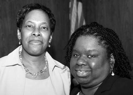 Hon. Wavny Toussaint (left) and BWBA Director Hon. Lisa Ottley.
