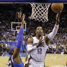 A rumored deal involving four teams and up to 14 players, not to mention several first-round draft picks, could land Magic center Dwight Howard in Brooklyn before the week is up. AP Photo
