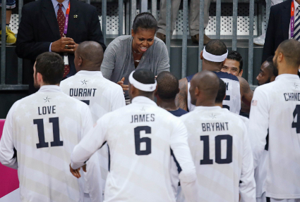 First Lady Michelle Obama hugged each and every member of Team USA, including Brooklyn-born Carmelo Anthony, followng the U.S.'s win over France on Sunday. AP Photo