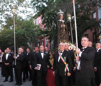 Honor guard prepares to carry the statue of Our Lady of Sorrows back into the church. Photo by Francesca Norsen Tate
