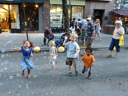 A favorite activity for kids: chasing bubbles.