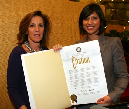 Anne Swern, left, and Pooja Bansal (general counsel to the Borough President), displaying Ms. Swernâ€™s citation from the Borough Presidentâ€™s Office.  Photo by Mario Belluomo