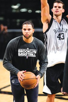 Nets point guard Deron Williams (foreground) and power forward Kris Humphries took their first-ever shots at Barclays Center this past weekend. Williams also took a swipe at Dallas Mavericks owner Mark Cuban.  AP Photo