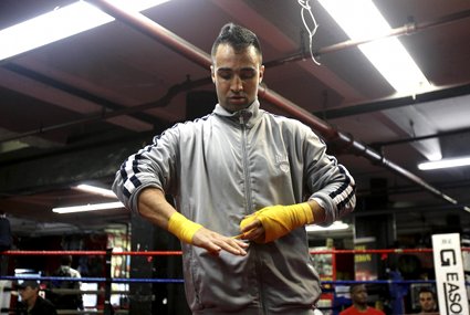 Benonshurst's Paulie Malignaggi prepares for Saturday's bout at Brooklyn's legendary Gleason's Gym.  AP Photo