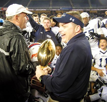 Lincoln coach Shawn O'Connor, who guided the Railsplitters to the title last winter, knows what it's like to have a team on a mission following a tough championship game loss. Eagle photo by Jim Dolan 