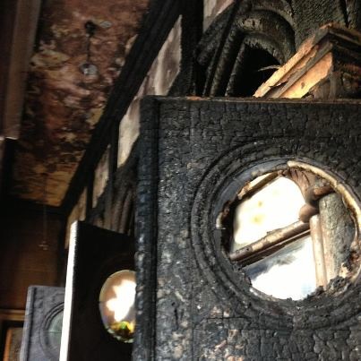 The fire damaged doors at STLSM Church-photo courtesy of the church.jpg