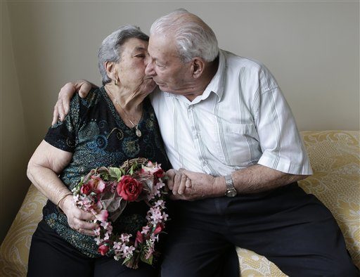 It’s Valentine’s Day. Let the kissing commence. AP photo by Kathy Willens