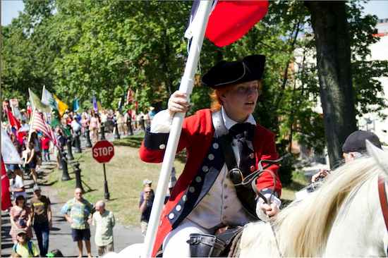 A Revolutionary War reenactor leads the way up Battle Hill in Green-Wood Cemetery. Eagle photos by Eugena Ossi