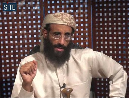 In this image taken from video and released by SITE Intelligence Group on Monday, Nov. 8, 2010, Anwar al-Awlaki speaks in a video message posted on radical websites. (AP Photo/SITE Intelligence Group, File)