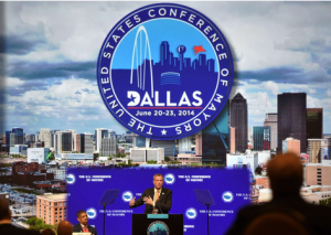 Bill de Blasio at the podium in Dallas discussing inequality in cities across the country
