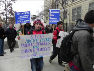 People rallied against a charter school at Seth Low earlier this year. Photo by Paula Katinas