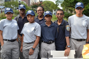 Volunteer youth officers from the 84th Precinct — including Kaleah Amaro, Kiya Frzier, Isaiah Hudson, Laure De Los Santos, Shawn Rambharan, Tyra Jones and Elijah Muhammad — helped out during last year’s National Night Out Against Crime by registering cell phones in the NYPD’s database. Eagle photo by Rob Abruzzese