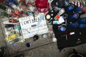 A memorial for Eric Garner rests on the pavement near the site of his death in Staten Island