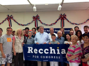Congressional candidate Domenic Recchia (center) organized a group of volunteers to go door to door to talk to voters