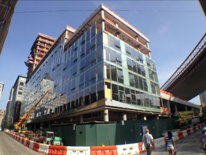 Gaze into the glass façade of the DUMBO developer family's Dock Street project