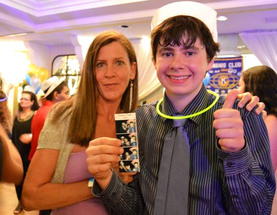 Jonathan, who attends The HeartShare School, on the dance floor with his mother, Marie, at the “Dream Prom” for teens with autism hosted by the 86th Street Kiwanis Club