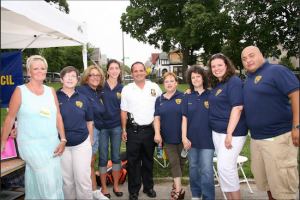 Members of the 68th Precinct Community Council are pictured with Dep. Insp. Eric Rodriguez, the precinct’s former commanding officer, at a Night Out event in Shore Road Park a few years ago