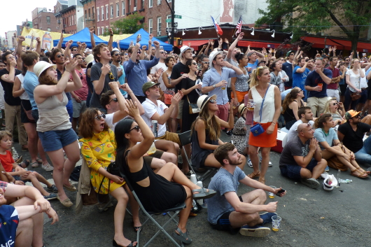 Bastille Day crowd on Smith Street cheers the World Cup final. Photo by Mary Frost
