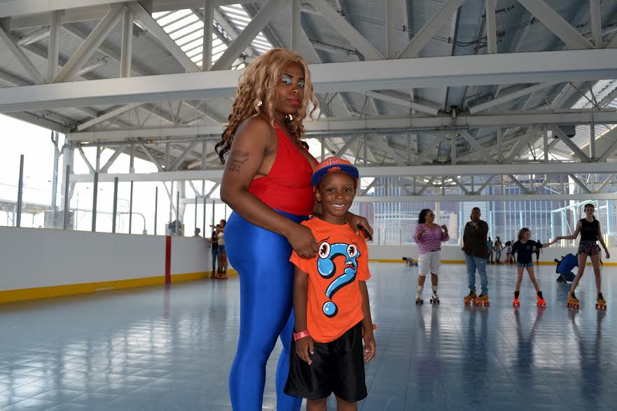Mother and son roller skate at Pier Two