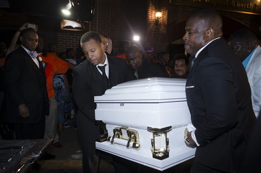 Pallbearers carry the casket of Eric Garner, who was choked to death by the NYPD, according to a medical examiner's report