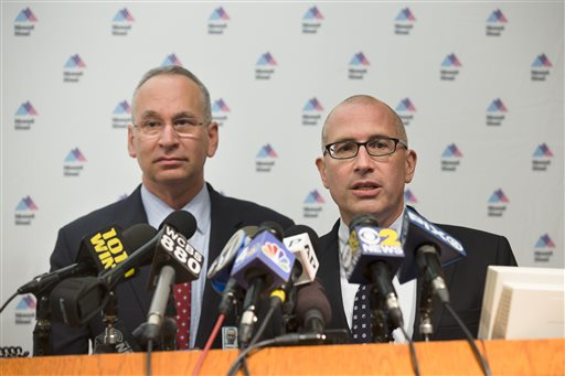 Jeremy Boal, Chief Medical Officer for the Mount Sinai Health System, right, speaks during a news conference alongside David Reich, President of Mount Sinai Hospital, left. A male patient with a high fever and gastrointestinal symptoms underwent testing for the Ebola virus following a recent trip to West Africa but probably does not have the disease