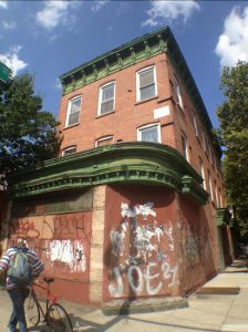 Bed-Stuy eye candy, if you don't mind the covered-over windows: 435 Tompkins Ave. Eagle photos by Lore Croghan