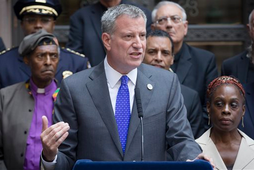 Bill de Blasio's administration agreed to a new labor contract with the union that represents school safety agents on Tuesday.