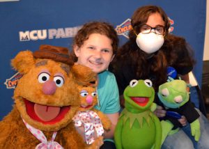 Jessica (left) and Avalon Mercado had a chance to meet Kermit the Frog and Fozzie Bear thanks to the Make-A-Wish Foundation. Photo by Rob Abruzzese