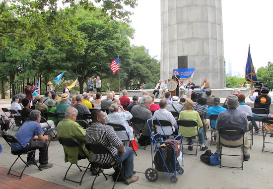 Ron Schweiger, president of the Society of Old Brooklynites, addressed the audience at the Prison Ship Martyrs Monument in Fort Grene Park. Photo by Matthew Taub.