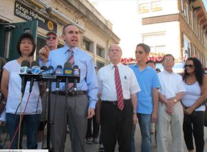 Democratic district leader-elect Nancy Tong, Councilmember Mark Treyger (center) and Assemblymember Bill Colton stand with concerned residents.