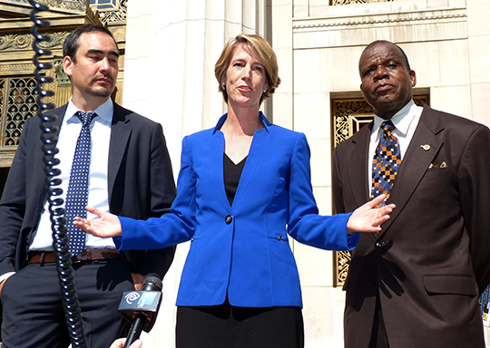 Zephyr Teachout, Tim Wu and a supporter at the state appeals court in Brooklyn on Tuesday.