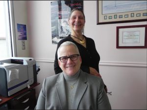 Donna Mae DePola (seated) president and CEO of the Sunset park-based drug and alcohol counseling program, Resource Training and Counseling Center, announced that the center has opened up a new site in Bay Ridge. She is pictured with Dona Pagan, the center’s vice president.