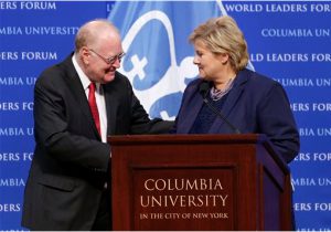 Norway Prime Minister Erna Solberg, right, is greeted by Columbia University Provost and professor John Coatsworth on Thursday.