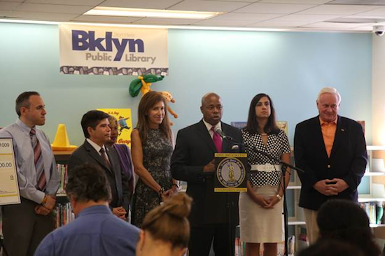 Borough President Eric Adams announces his $6.92 million capital budget investment in libraries and cultural institutions at a press conference at Bay Ridge Library