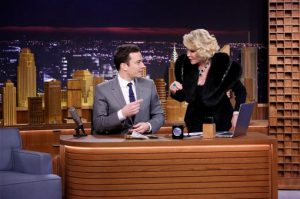 Late night host Jimmy Fallon, shown here with late Brooklyn native Joan Rivers, celebrates his birthday today.