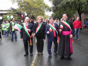 The grand marshals, Assembly member William Colton, Investors Bank Vice President Regina Scire, Council member Vincent Gentile, and the Rev. Msgr. Jamie Giganitello (left to right) led the marchers up 18th Avenue.