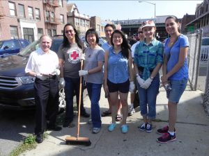 Assemblymember Bill Colton (left) led a litter sweep in Bensonhurst in August. Now, he wants the city to go after dog owners who don’t clean up after their pets.