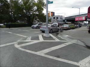 The DOT is painting extensions of curbs at a handful of intersections in Bay Ridge. The effect, as this photo of a curb on 18th Avenue and 84th Street in Bensonhurst shows, is to offer a wider area of space that is off-limits to cars. Eagle photo by Paula Katinas