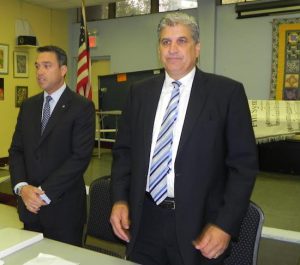 U.S. Rep. Michael Grimm (left) and his challenger, former councilmember Domenic Recchia, get set for their big debate Wednesday in Bay Ridge. It was the first time the two have faced each other.