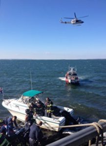 Police and fire rescue units responded to a boat in distress. Photo by Scarlett