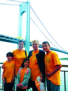 Anne Strafaci (second from right) and members of her family took part in the annual walk-a-thon for Saint Patrick Catholic Academy in Bay Ridge. The event was dedicated to the memory of her late husband, Thomas J. Strafaci. Anne is pictured on the walk-a-thon route with her daughter Beth Albano and grandchildren Luka, Emily and Nicholas (left to right).