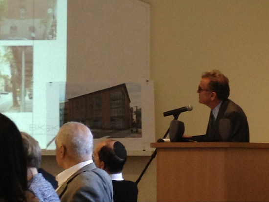 Architect Stephen Byrns gives a presentation at a Landmarks Preservation Commission hearing of his design for a proposed apartment building at 112 Atlantic Ave. Eagle photo by Lore Croghan